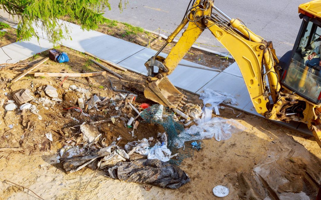 excavator-working-on-junk-dump-garbage-on-the-cit-2022-11-12-10-54-24-utc